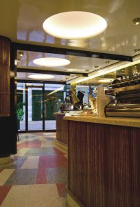 Located at the Kava Cafe in NYC solid wood tambour wainscot and wallpaneling