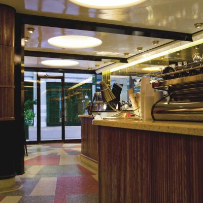 Located at the Kava Cafe in NYC solid wood tambour wainscot and wallpaneling